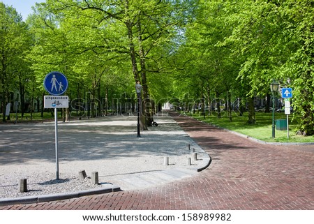 Park avenue and street of the Lange Voorhout in the city center of Den Haag (The Hague), South Holland, the Netherlands.
