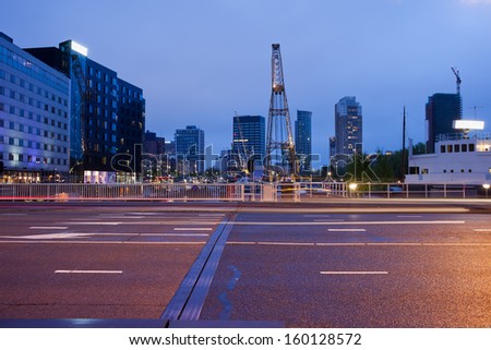 Schiedamsedijk multi lane street at night in the city center of Rotterdam in South Holland, the Netherlands.