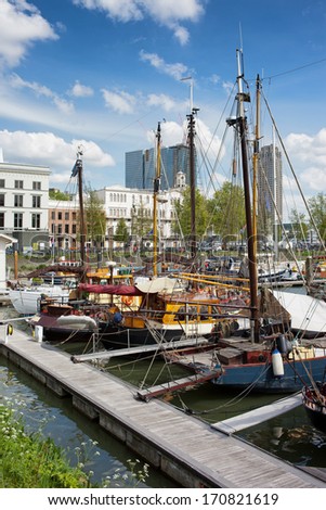 Sail boats moored at port in the city centre of Rotterdam, South Holland, the Netherlands.