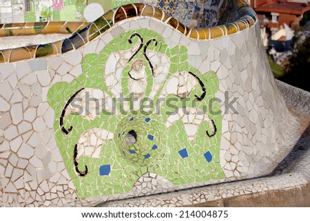 Trencadis abstract mosaic, part of Serpentine Bench at Gaudi\'s Park Guell in Barcelona, Catalonia, Spain.