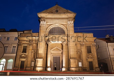 Church of Conversion of Saint Paul by night in Krakow, Poland, 18th century Baroque style architecture.