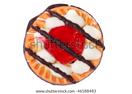 Delicious sweet biscuit cookie with jelly, icing and chocolate on top, isolated on white background.