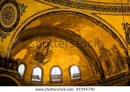 Blessed Virgin Mary with baby Jesus and Guardian Angel Byzantine art on the Hagia Sophia apse in Istanbul, Turkey
