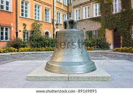 Huge 17th century cracked bronze bell on the Kanonia Square in the Old Town of Warsaw, Poland