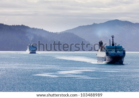 Huge car ferry ships in calm water of Marlborough Sounds, South Island, New Zealand