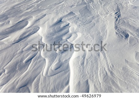 Wind created patterns on surface of packed snow
