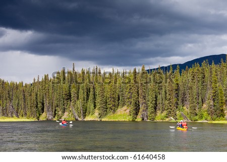 Tandem Kayaks on Big Salmon River, Yukon T., Canada