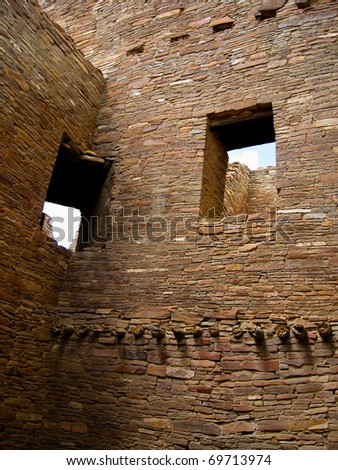 Ruin wall with window opening of laid sandstone bricks of pueblo bonito in chaco canyon, New Mexico, USA, the centre of sunken Anasazi Culture of ancestral native Americans.