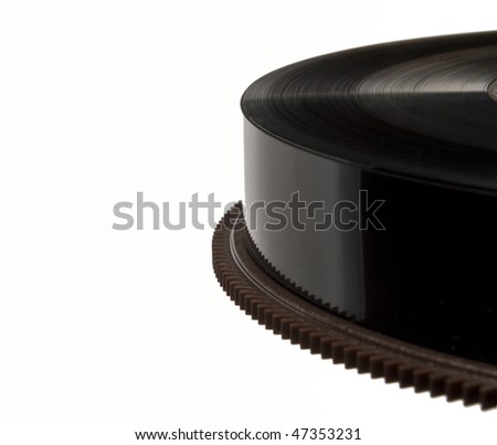 Closeup on reel of black magnetic tape used for backup