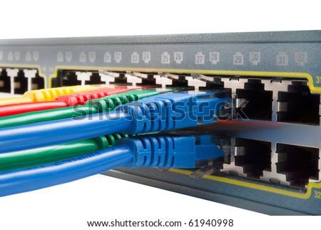 Bunch of Colored ethernet network cables connected to a switch isolated on white background. Top view