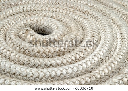Old nautical rope - Closeup Detail on a reel of twisted boat\'s rope