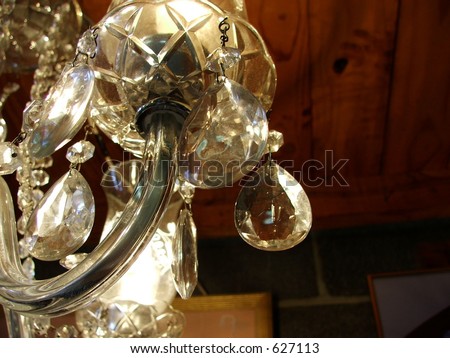 Lit chandelier at an antique shop