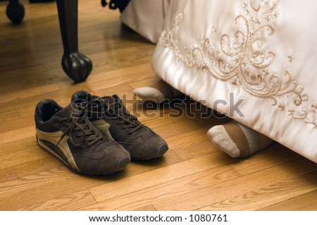 Bride\'s feet with tennis shoes
