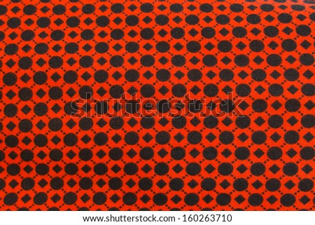 Red and black checkered tablecloth background, texture