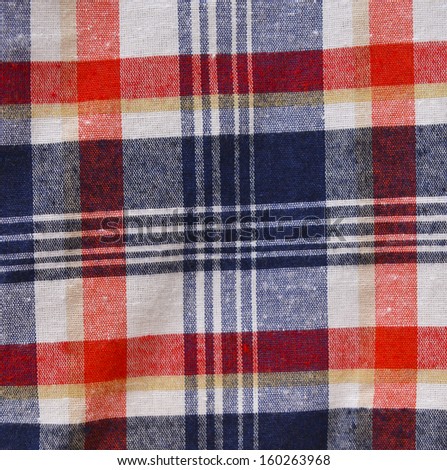 red checked fabric abstract texture.