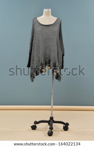 Female female gray clothing on mannequin isolated