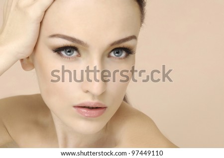 Beauty portrait of young woman with healthy skin on a face