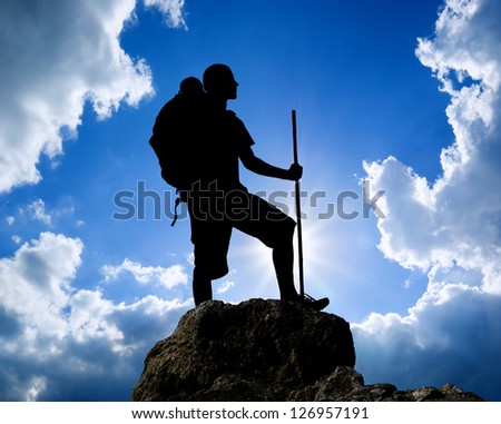 Man on top of mountain. Conceptual design.