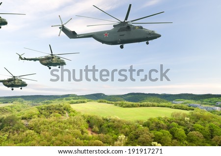 Flight of aircraft in the sky, a group of military helicopters. circa May 2014. Crimea.