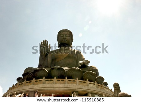 Tian Tan Buddha Statue sitting for people to pay respect which was located at Lantau island in Hong Kong.