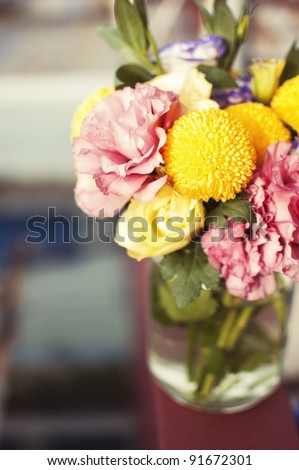 Bunch of flowers in a glass jar