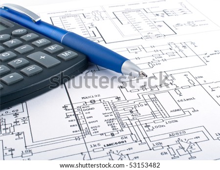 Calculator  and pen on electrical diagram