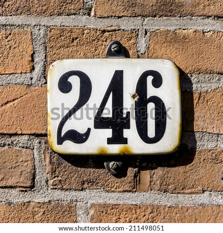 enameled house number two hundred and forty six.