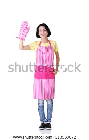 Young housewife in pink apron ang glove, isolated on white