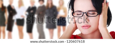 Closeup of frustrated young woman holding her ears. Social phobia concept