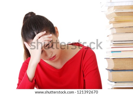 Sad female student with learning difficulties , isolated on white