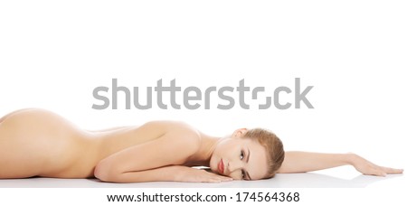 Beautiful caucasian naked woman lying down Isolated on white Beautiful caucasian naked woman lying down Isolated on white