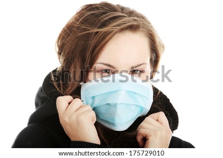 A model wearing a mask to prevent \'Swine Flu\' infection. Isolated