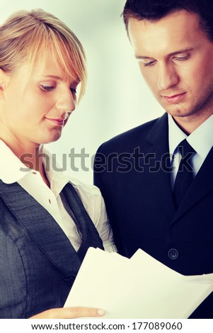 Young attractive business people isolated