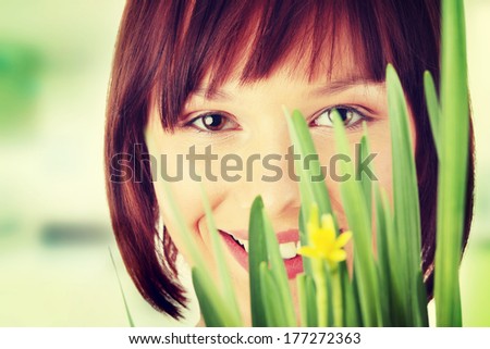 Spring girl with flower portrait, over white background