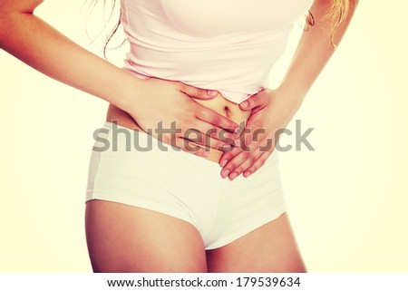 Woman heaving belly ache