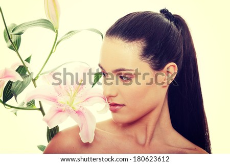 Spa woman with flower  isolated on white background