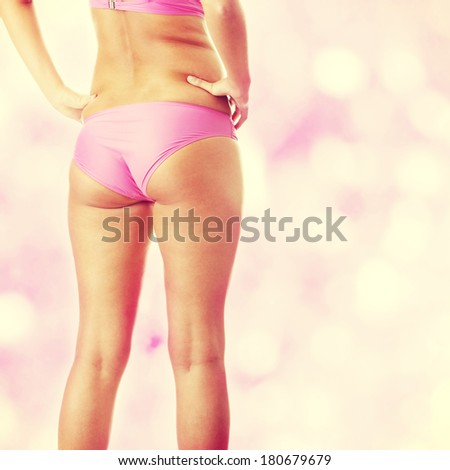 Beautiful model back in pink bikini