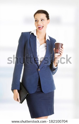 Business woman with cartoon mug - coffee time