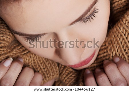 Young woman is having depression. Over black background.