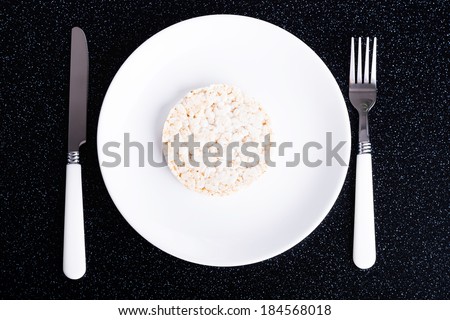 One rice waffle on a white plate.