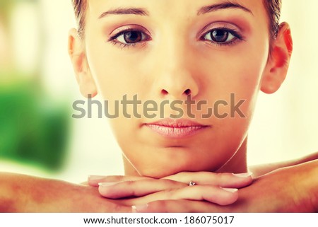 Close-up, portrait of a beautiful woman getting ready for the spa treatment