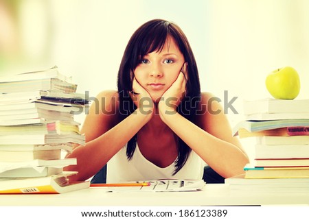 Young woman studying at the desk