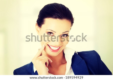 Portrait of young success businesswoman or student in elegant clothes