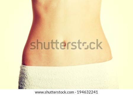 Front view of a fit belly closeup wrapped with in a towel