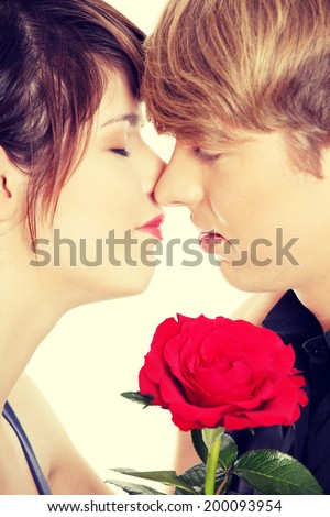 Kissing young couple close up