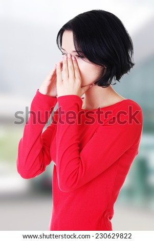 Young woman with sinus pressure pain.