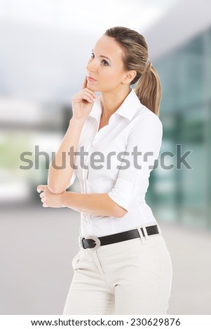 Beautiful young student,business woman thinking