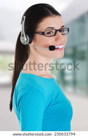 Casual woman with microphone and headphones
