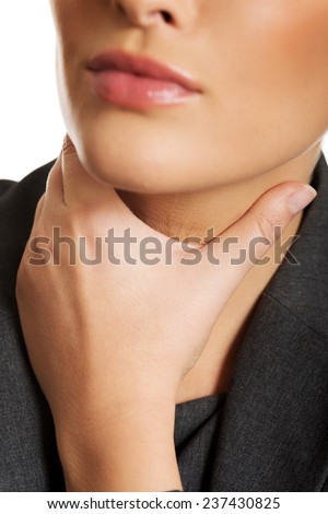 Woman with terrible throat pain.