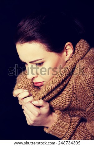 Young woman is having depression. Over black background.